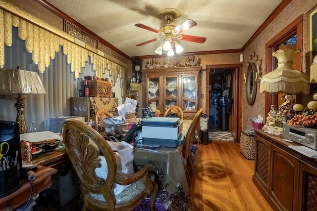 4830 W Oakdale Ave, Chicago, IL 60641 - home office with light wood finished floors, a ceiling fan, crown molding, and a textured ceiling