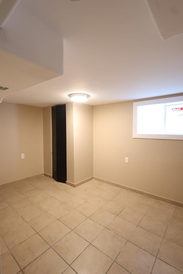 15239 Vincennes Rd, Phoenix, IL 60426 - below grade area with light tile patterned floors