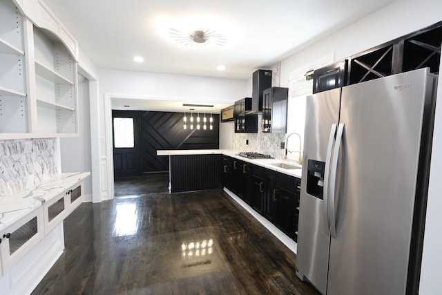 15239 Vincennes Rd, Phoenix, IL 60426 - kitchen with stainless steel appliances, dark cabinets, tasteful backsplash, dark wood-style floors, and wall chimney exhaust hood