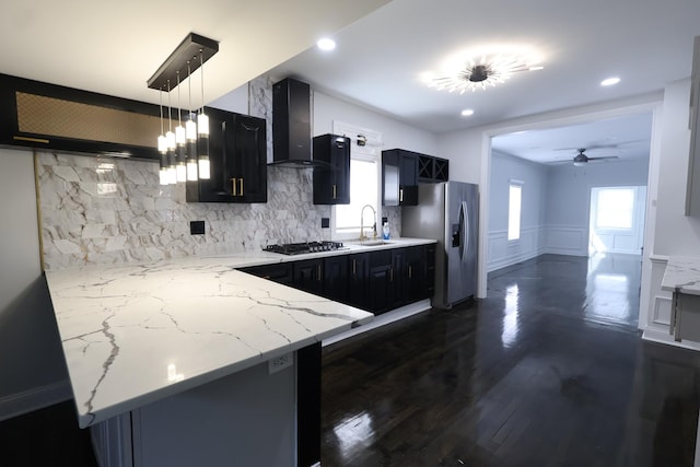 15239 Vincennes Rd, Phoenix, IL 60426 - kitchen featuring stainless steel refrigerator with ice dispenser, wall chimney exhaust hood, dark cabinetry, ceiling fan, and recessed lighting