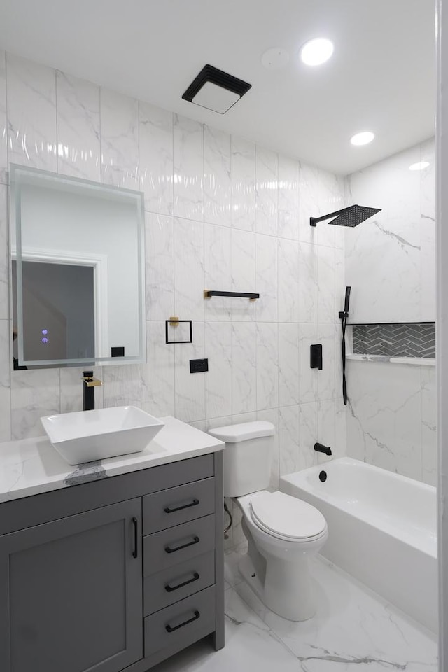 15239 Vincennes Rd, Phoenix, IL 60426 - full bathroom with vanity,  shower combination, tile walls, marble finish flooring, and tasteful backsplash