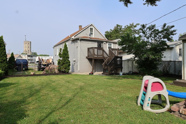 15239 Vincennes Rd, Phoenix, IL 60426 - back of property with stairway, a wooden deck, and a chimney