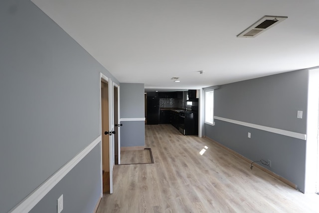 15239 Vincennes Rd, Phoenix, IL 60426 - corridor featuring light wood-style floors and baseboards