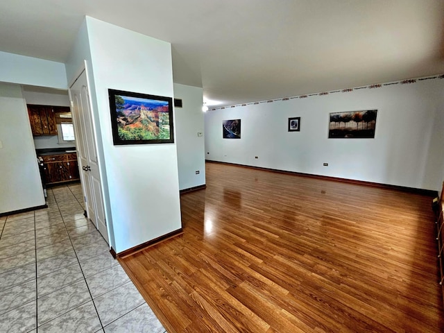 611 Kungs Way, Joliet, IL 60435 - spare room with light wood-style flooring and baseboards