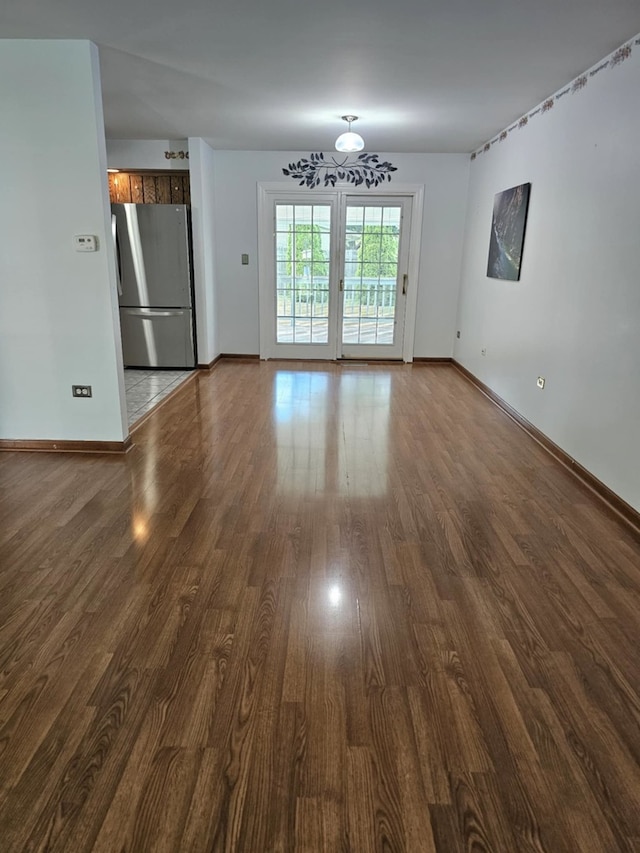 611 Kungs Way, Joliet, IL 60435 - spare room featuring dark wood finished floors and baseboards