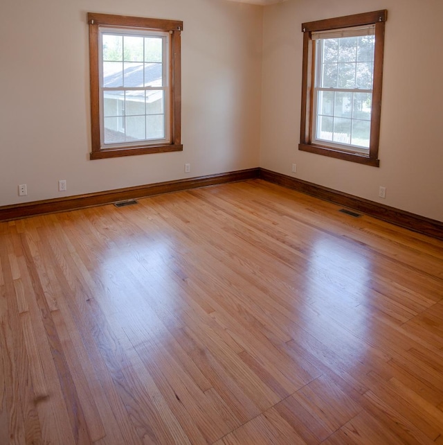 224 N Maple St, Gilman, IL 60938 - spare room with light wood finished floors and baseboards