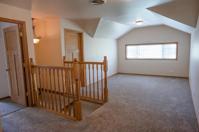 224 N Maple St, Gilman, IL 60938 - additional living space with carpet floors and lofted ceiling