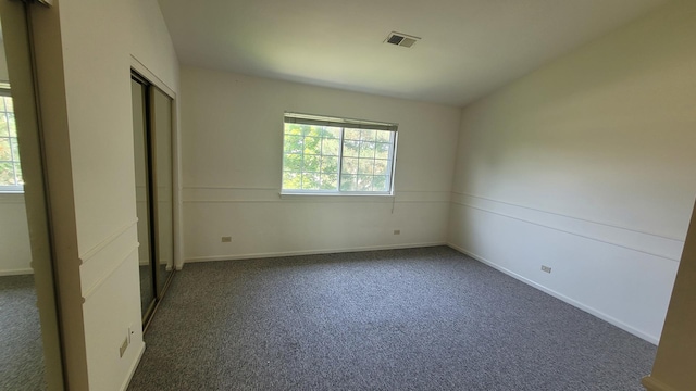 17885 W Salisbury Dr, Gurnee, IL 60031 - unfurnished bedroom featuring a closet and carpet floors