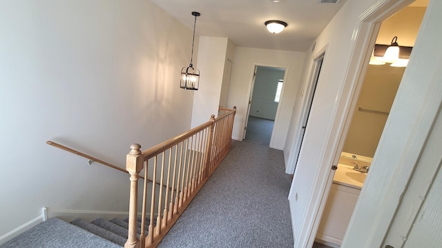 17885 W Salisbury Dr, Gurnee, IL 60031 - hallway with carpet and an upstairs landing