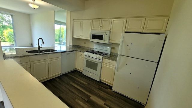 17885 W Salisbury Dr, Gurnee, IL 60031 - kitchen featuring white appliances, white cabinetry, dark wood-style flooring, and plenty of natural light