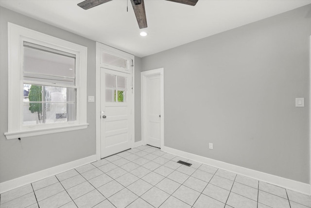 unfurnished room with a ceiling fan, recessed lighting, and light tile patterned floors