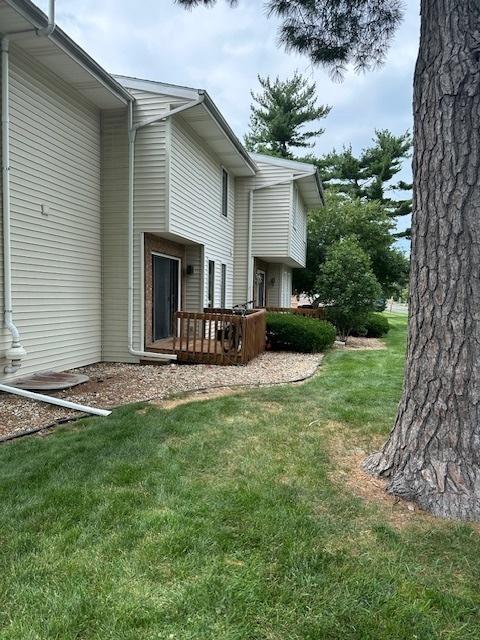 903 N Linden St Unit 3, Normal, IL 61761 - back of house featuring a wooden deck and a yard