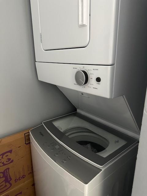 903 N Linden St Unit 3, Normal, IL 61761 - laundry area featuring stacked washer / dryer