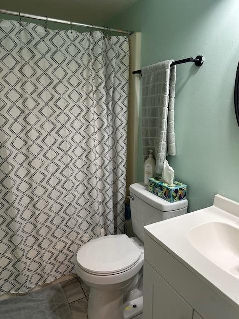 903 N Linden St Unit 3, Normal, IL 61761 - full bath with vanity, tile patterned flooring, and a shower with shower curtain