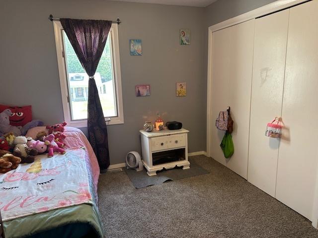 903 N Linden St Unit 3, Normal, IL 61761 - carpeted bedroom featuring a closet