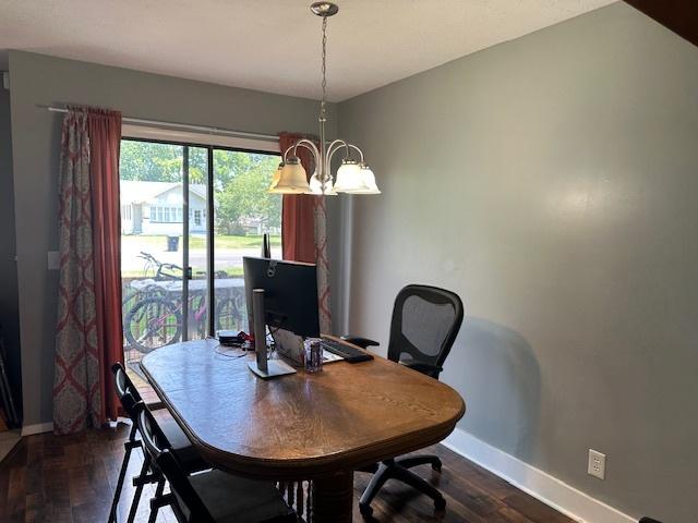 903 N Linden St Unit 3, Normal, IL 61761 - dining room featuring a chandelier, dark wood-type flooring, and an office area