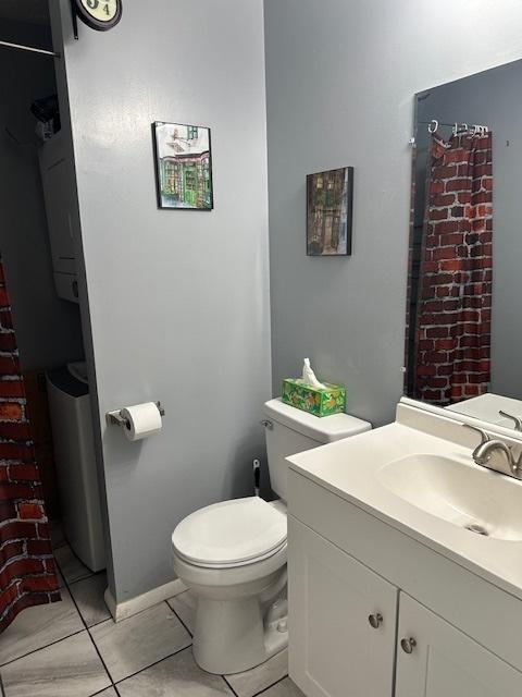 903 N Linden St Unit 3, Normal, IL 61761 - bathroom featuring vanity and tile patterned flooring