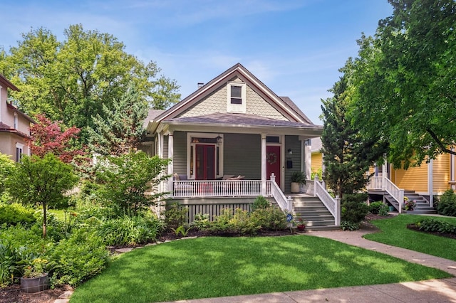 1422 Wesley Ave, Evanston, IL 60201 - view of front of home with a porch, stairs, and a front yard