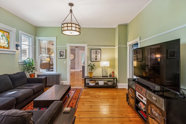 1422 Wesley Ave, Evanston, IL 60201 - living room featuring radiator and light wood-style floors