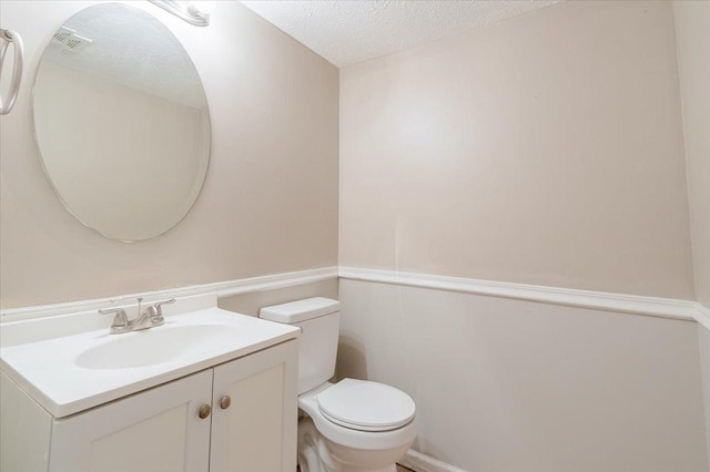 6 Starlight Ct, Bloomington, IL 61704 - half bath featuring vanity and a textured ceiling