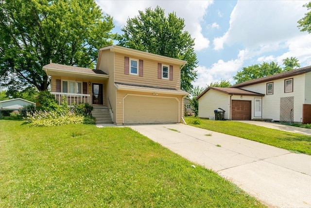 6 Starlight Ct, Bloomington, IL 61704 - tri-level home featuring covered porch, a front yard, a garage, and driveway