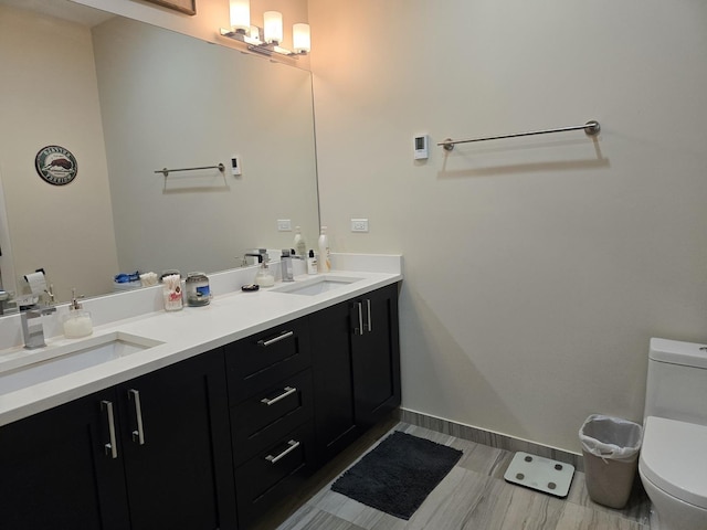 2744 N Lincoln Ave Unit 2, Chicago, IL 60614 - full bathroom featuring toilet and double vanity