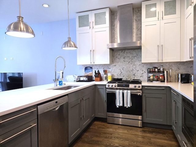 2744 N Lincoln Ave Unit 2, Chicago, IL 60614 - kitchen with appliances with stainless steel finishes, wall chimney range hood, gray cabinetry, and light countertops