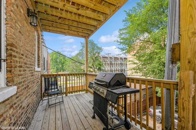 3252 S Prairie Ave Unit 2S, Chicago, IL 60616 - wooden deck featuring a grill
