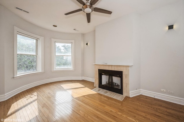 3252 S Prairie Ave Unit 2S, Chicago, IL 60616 - unfurnished living room with hardwood / wood-style floors, ceiling fan, and a fireplace