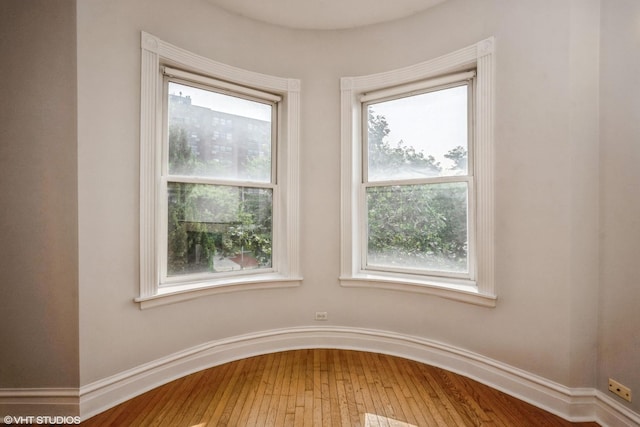 3252 S Prairie Ave Unit 2S, Chicago, IL 60616 - detailed view of wood finished floors and baseboards