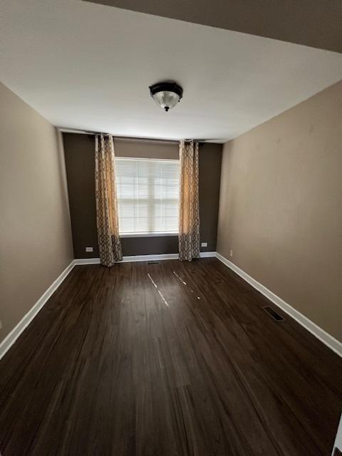 372 S Crown Ct, Palatine, IL 60074 - empty room with baseboards and wood finished floors