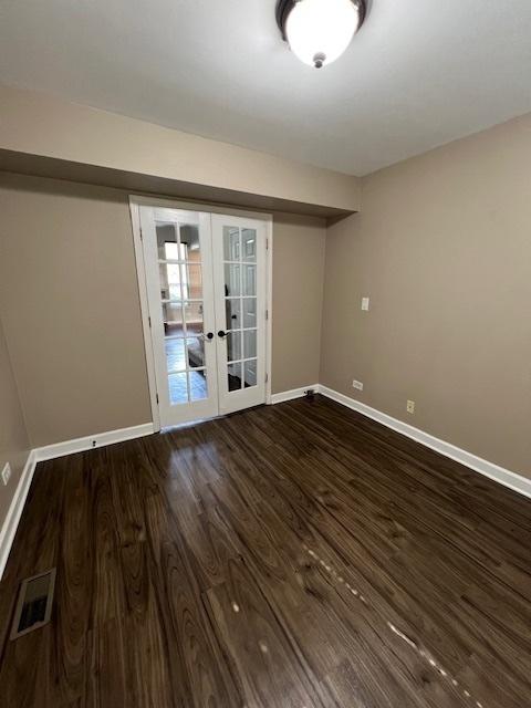 372 S Crown Ct, Palatine, IL 60074 - unfurnished room with french doors and wood finished floors