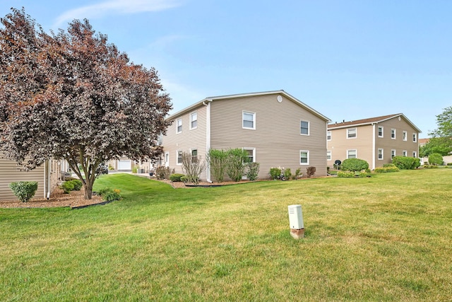 7926 164th Pl Unit 7926, Tinley Park, IL 60477 - view of home's exterior with a yard