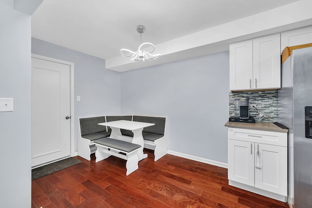 7926 164th Pl Unit 7926, Tinley Park, IL 60477 - dining space featuring dark wood-type flooring and a chandelier