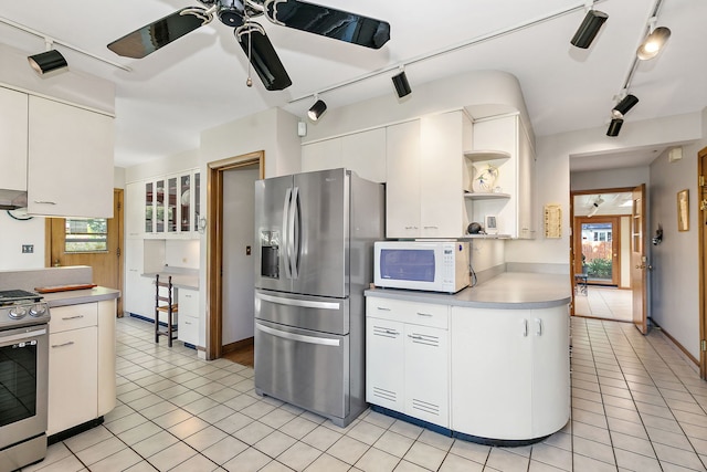 306 Wing Park Blvd, Elgin, IL 60123 - kitchen featuring appliances with stainless steel finishes, open shelves, a ceiling fan, track lighting, and plenty of natural light
