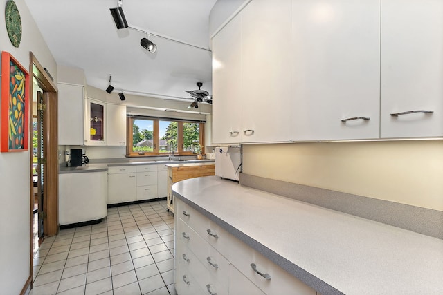 306 Wing Park Blvd, Elgin, IL 60123 - kitchen with white cabinets, light tile patterned flooring, a ceiling fan, and glass insert cabinets