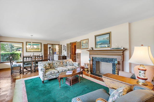 306 Wing Park Blvd, Elgin, IL 60123 - living area featuring a chandelier and a premium fireplace