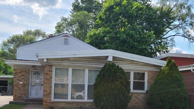 15408 Dobson Ave, Dolton, IL 60419 - view of home's exterior featuring brick siding