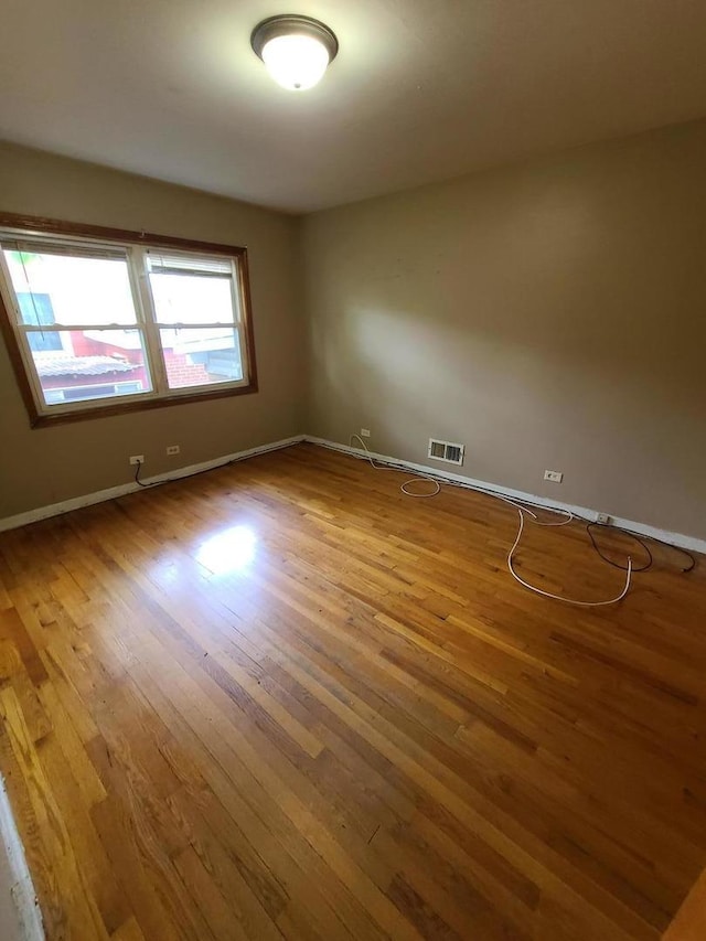 15408 Dobson Ave, Dolton, IL 60419 - empty room with wood finished floors