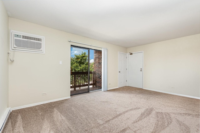 1131 Cedar St Unit 2B, Glendale Heights, IL 60139 - unfurnished room featuring carpet flooring, a baseboard heating unit, and a wall mounted AC