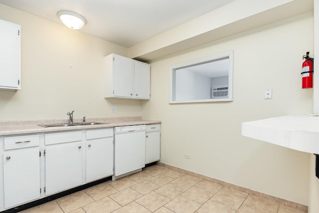 1131 Cedar St Unit 2B, Glendale Heights, IL 60139 - kitchen featuring dishwasher, light countertops, white cabinetry, and light tile patterned floors