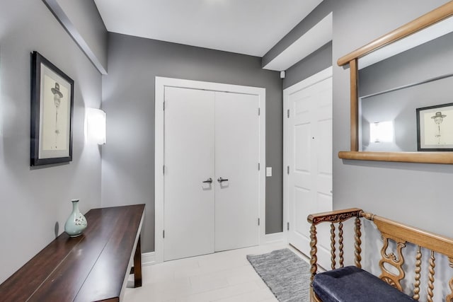 1001 W Madison St Unit 710, Chicago, IL 60607 - entrance foyer featuring tile patterned floors and baseboards