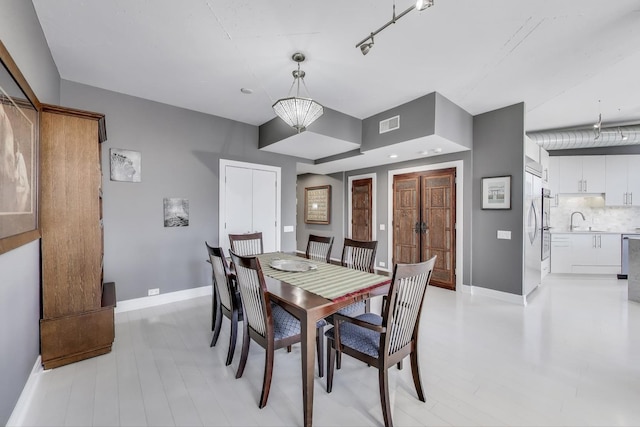 1001 W Madison St Unit 710, Chicago, IL 60607 - dining space with light wood finished floors