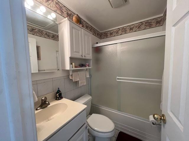 56 Vail Colony Unit 1, Fox Lake, IL 60020 - full bath with vanity, combined bath / shower with glass door, and tasteful backsplash