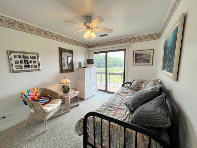 56 Vail Colony Unit 1, Fox Lake, IL 60020 - carpeted bedroom with access to outside and a ceiling fan