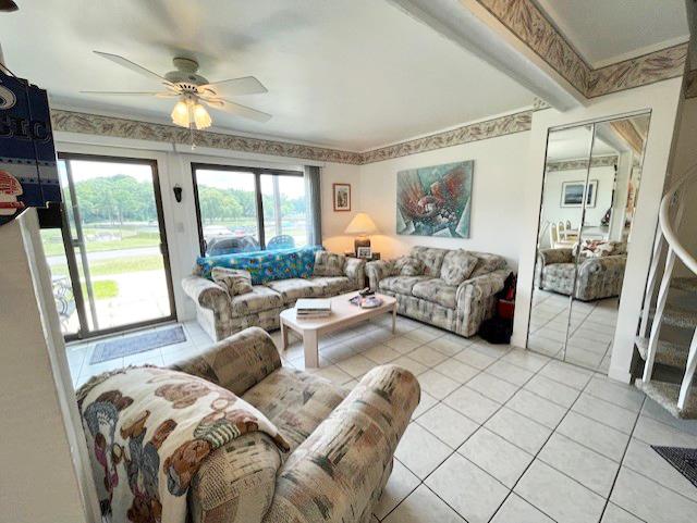 56 Vail Colony Unit 1, Fox Lake, IL 60020 - living area with a ceiling fan and light tile patterned floors