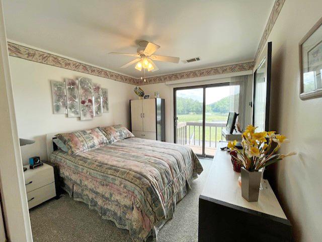 56 Vail Colony Unit 1, Fox Lake, IL 60020 - carpeted bedroom featuring access to outside and a ceiling fan