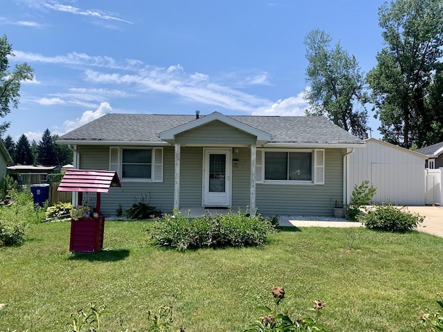 3122 Arlington Dr, Princeton, IL 61356 - bungalow featuring a front lawn and a shingled roof