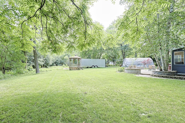 108 Poplar St, Mchenry, IL 60051 - view of grassy yard featuring a gazebo