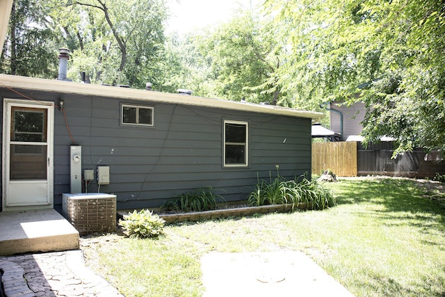 108 Poplar St, Mchenry, IL 60051 - view of home's exterior featuring a central air condition unit